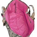 Inside of large python print tote bag with iconic pink lining and zipper closure