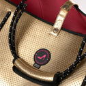Grote shopper goud met gaatjes detailfoto logo