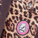Close-up detail of leopard shopper with brand logo and handles