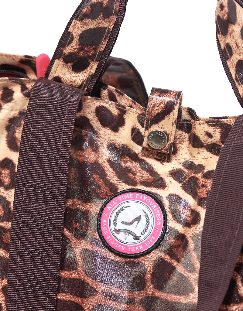 Detail of small leopard print tote bag with pink interior and ATF logo