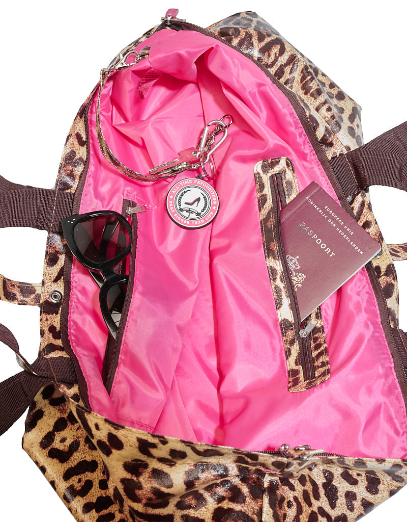 Innenseite der kleinen Shopper-Tasche im Leopardenmuster mit ikonischem rosa Futter und Fächern