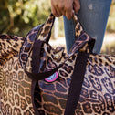 Kleine shopper luipaardprint in hand, met stevige hengsels en roze voering