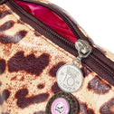 Close-up of zipper leopard makeup bag with lucky coin charm