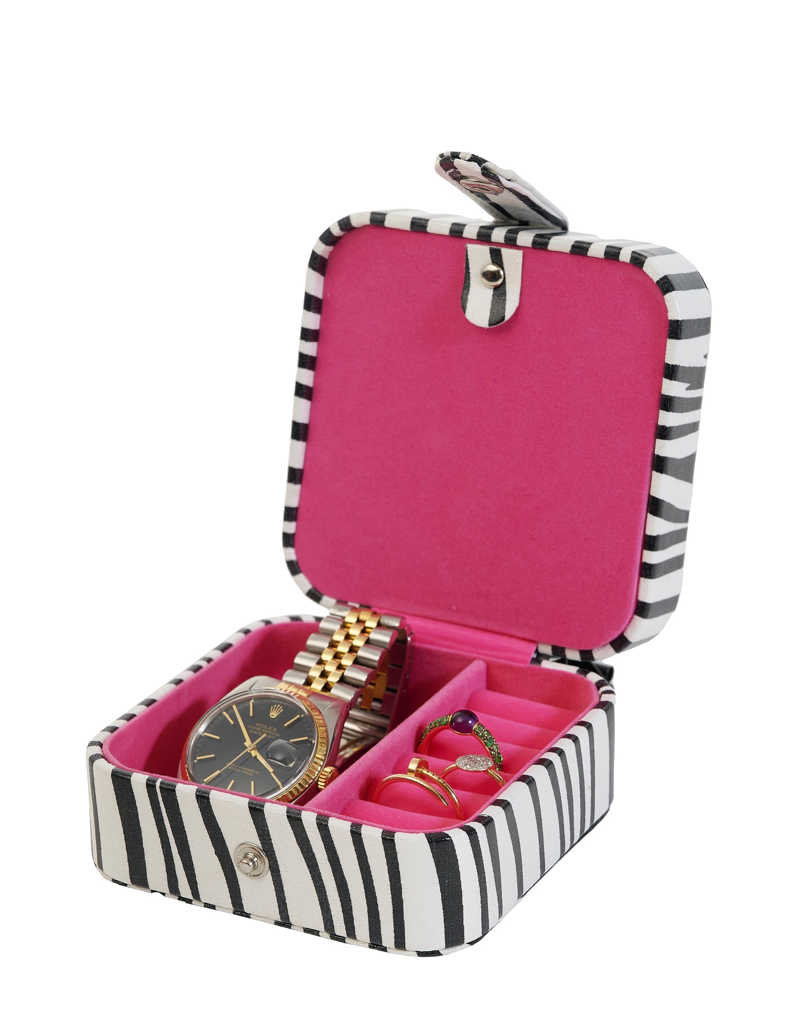 Open sieradendoosje in zebraprint met roze binnenkant, gevuld met een horloge en ringen