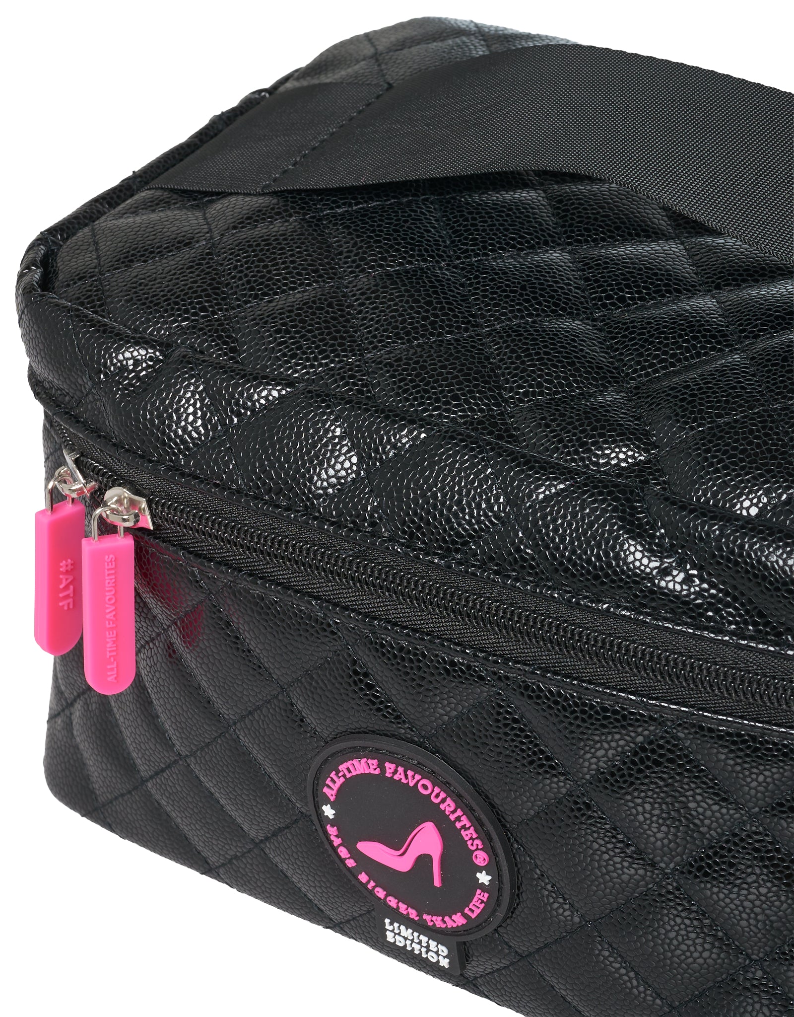 Black quilted makeup bag with pink accents and a visible brand logo on a white background