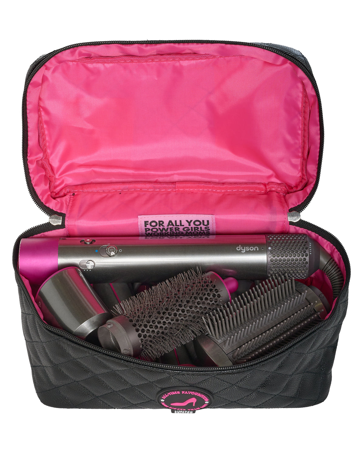Open black caviar KATE beauty case with Dyson hair tools and attachments, luxury leather accessory organizer.