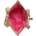 Gold handbag with pink interior on a white background