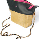 Crossbody bag in black vegan leather and beige straw with gold chain strap and zipper