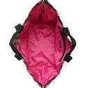 Interior of the Large Tote Bag Galle featuring bright pink lining, full zipper closure, two inner zip pockets and an interior strap to attach your ATF Toiletry Bag.