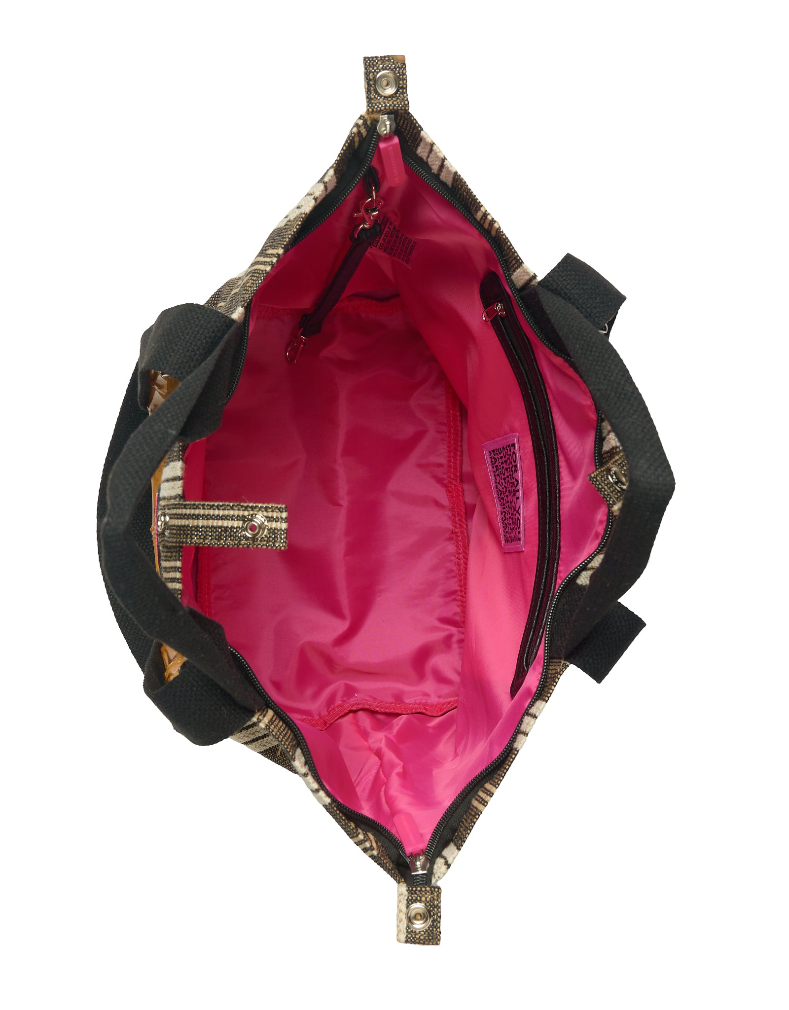 Interior of the Medium Tote Bag Galle featuring bright pink lining, full zipper closure, two inner zip pockets and an interior strap to attach your ATF Toiletry Bag.