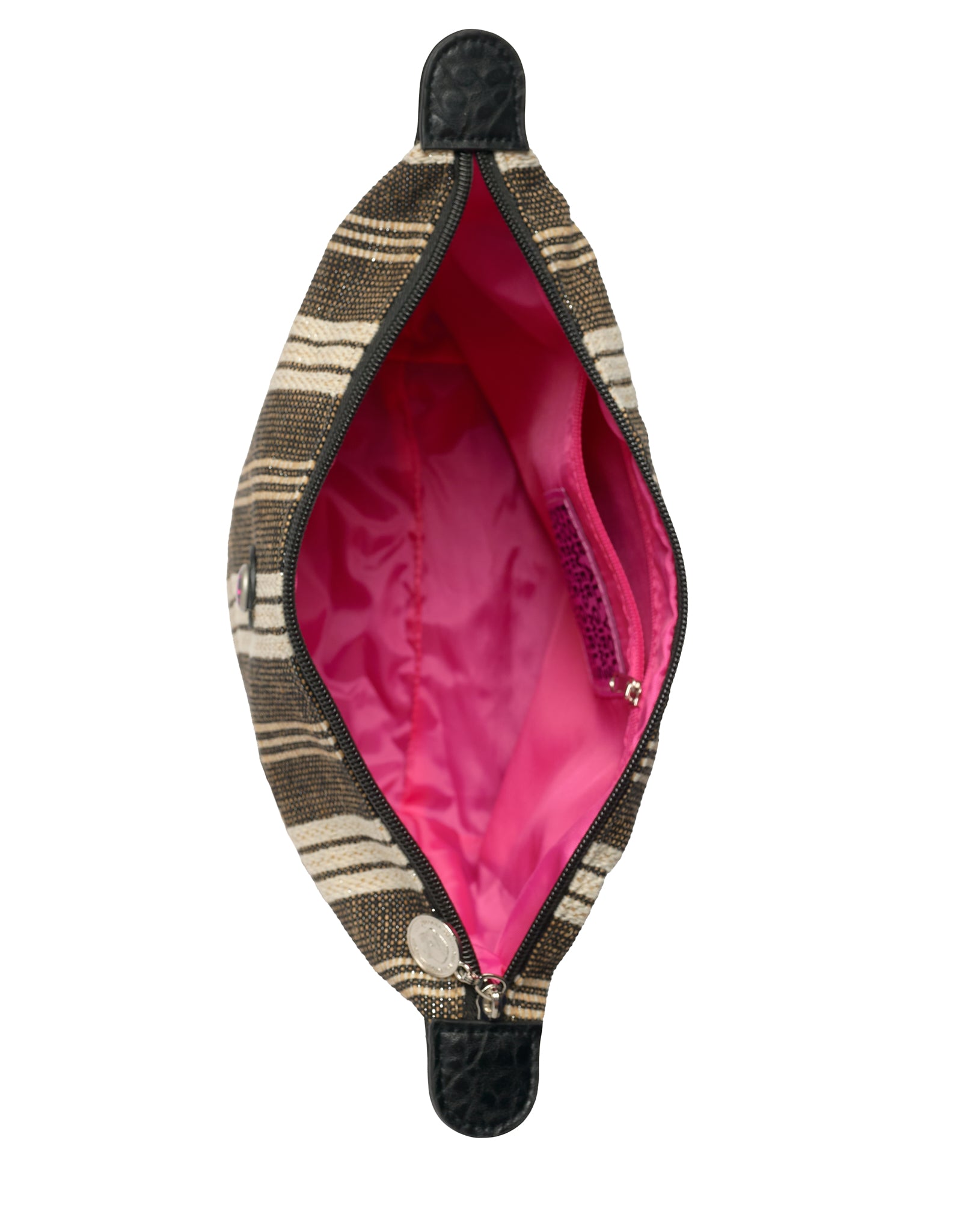Interior of the Toiletry Bag Galle in black and white stripe with bright pink lining, inner zip pocket and top zipper closure with signature coin charm.