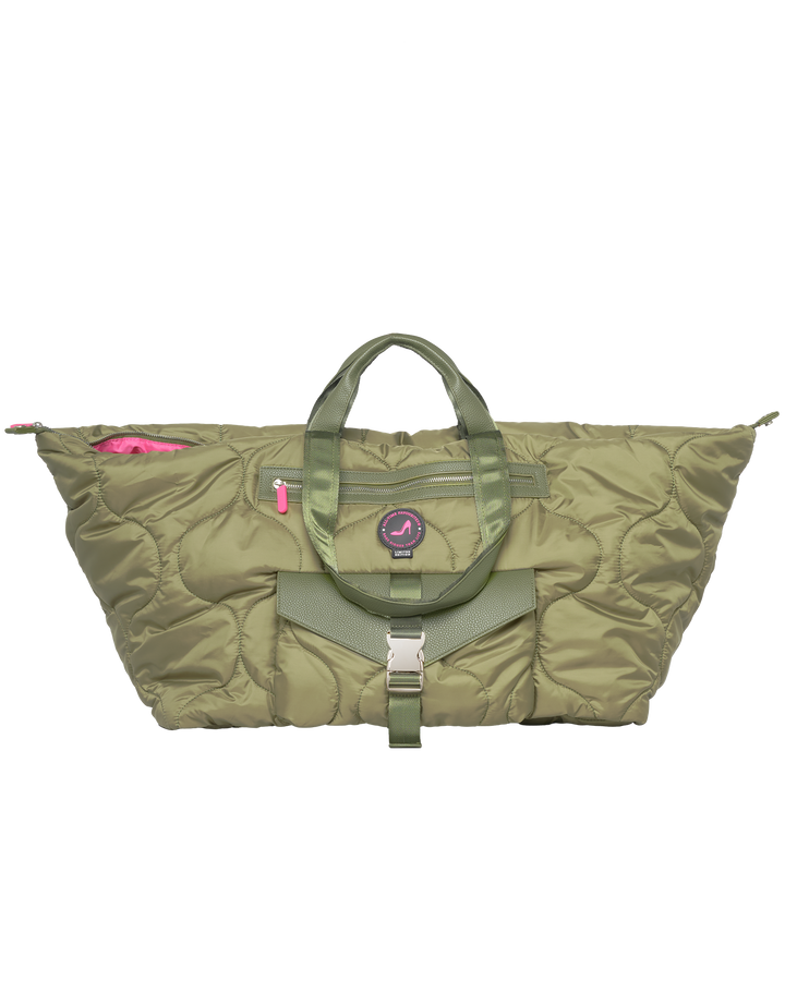 Green puffy tote bag with pink zipper and circular logo patch from All-time Favourites DIANA ski resort collection.