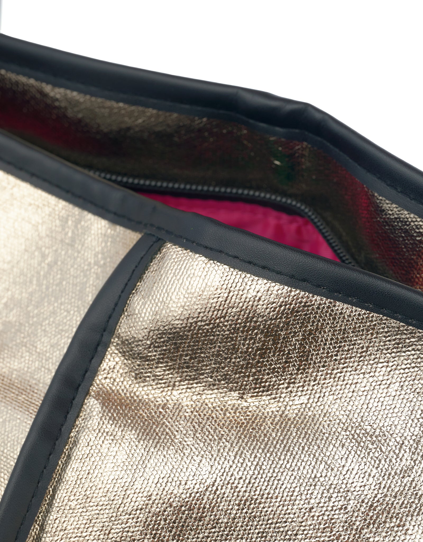 Close-up of Jaipur Tote Bag in champagne gold coated cotton with black piping and pink lining detail