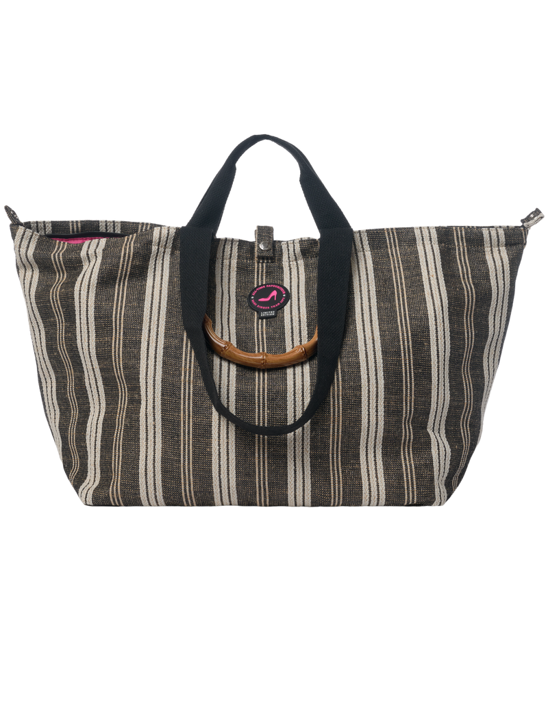 Medium Tote Bag Galle in black and white vertical stripe with bamboo handles, black straps and top zipper closure.