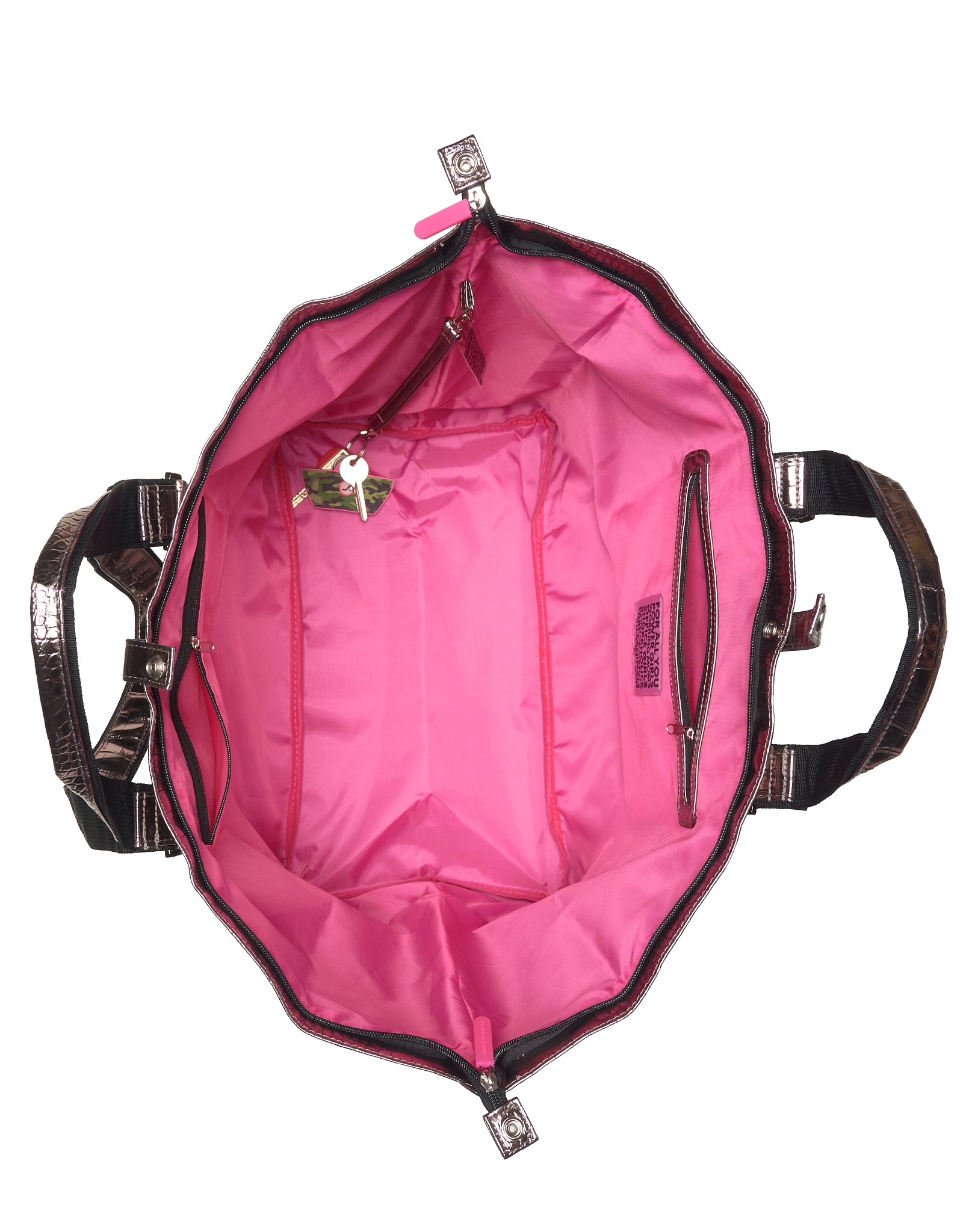 Pink lining of handbag with black and bronze handles on a white background