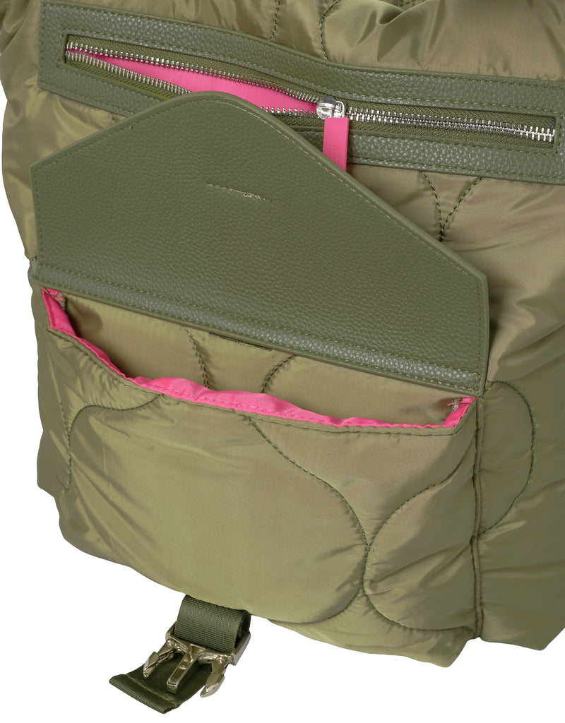 Close-up of a green nylon tote bag with a pink interior pocket on a white background