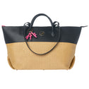 Black and straw resort tote bag in vegan leather with zipper and pink ATF letter keychain