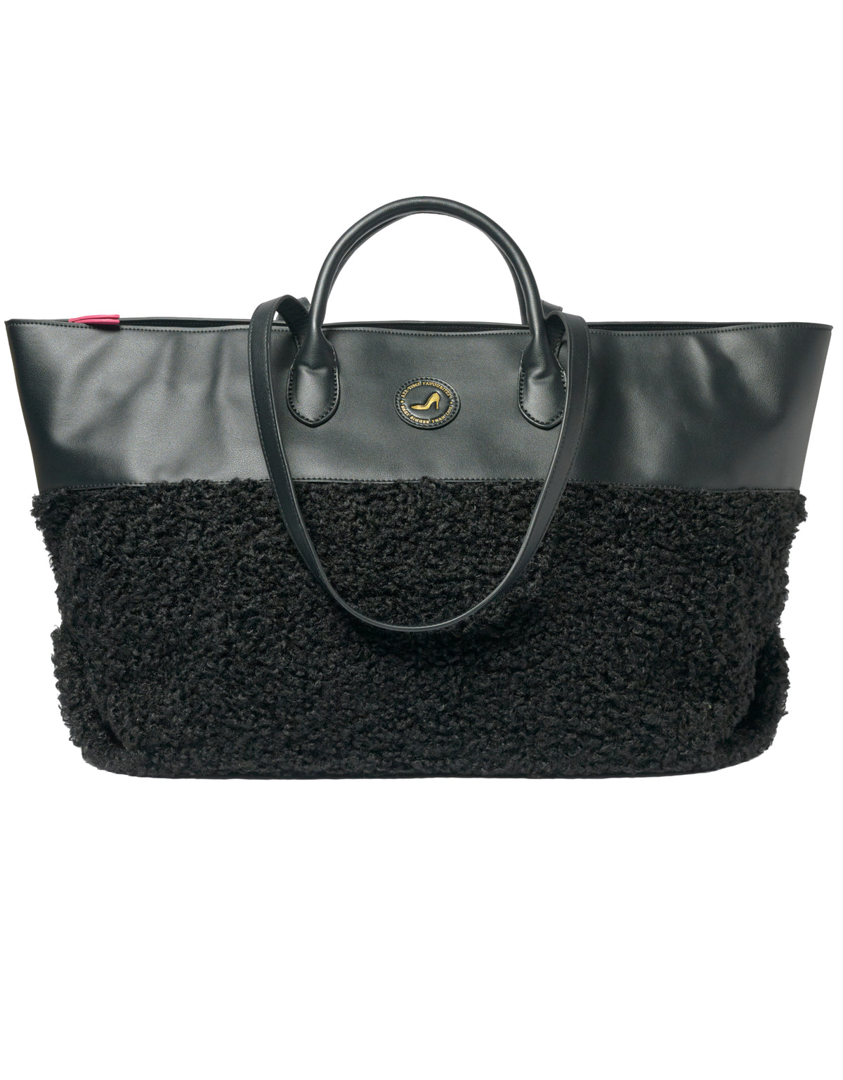 Medium tote bag in black faux shearling with vegan leather accents and round logo detailing.