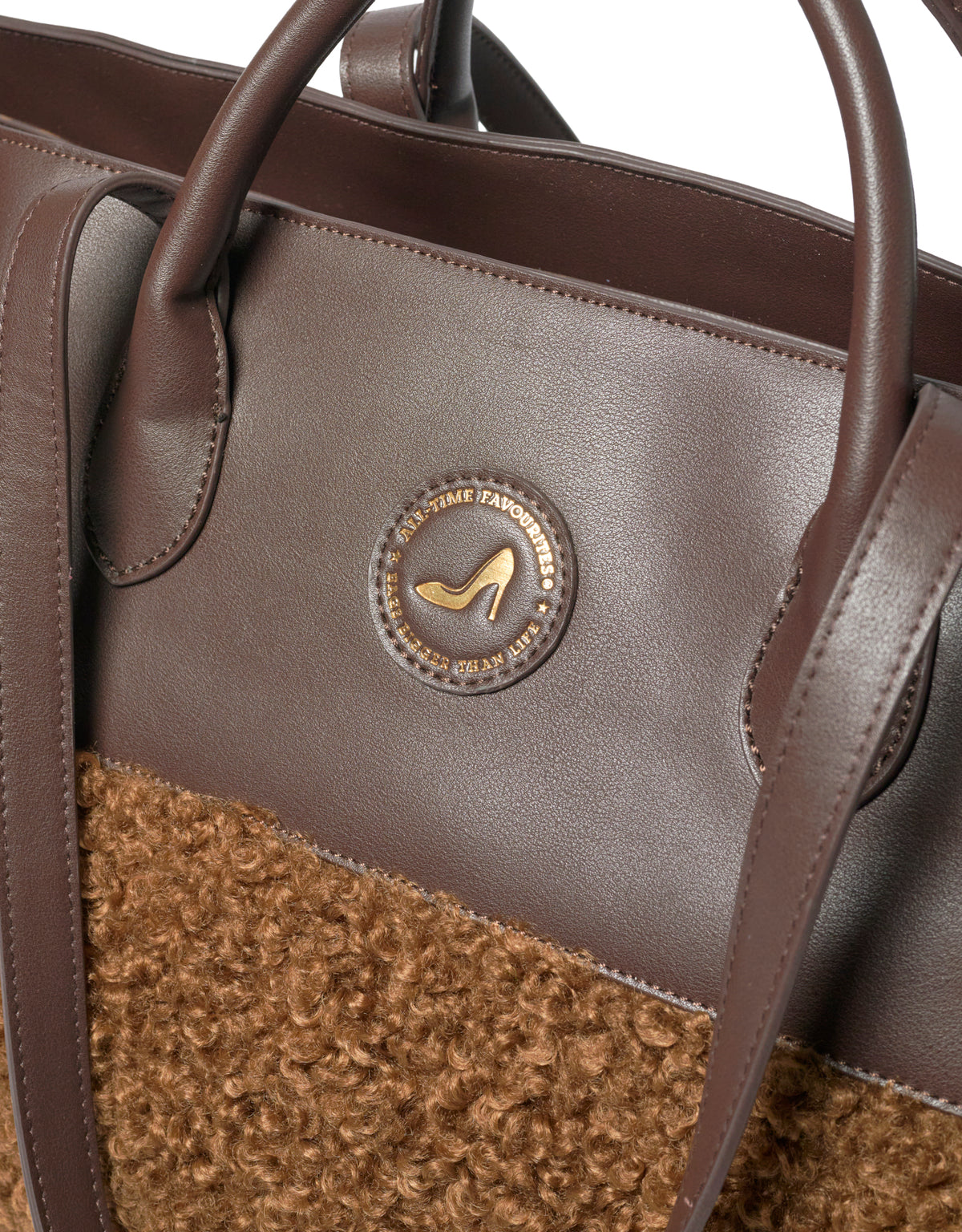Medium brown faux shearling tote bag with logo, GRACE by All-time Favourites, close-up on material and branding.