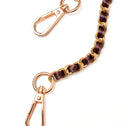 Brown and gold crossbody chain with gold-tone metal links and clasps, displayed on a white background.
