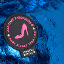 Patch with 'All Time Favourites' branding on a blue textured background