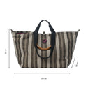 The Medium Tote Bag Black & White GALLE features a black-and-white vertical stripe pattern, sturdy bamboo handles, and a spacious 36 x 64 x 24 cm design—perfect for carrying all your essentials in style.