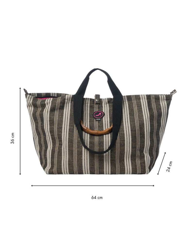 The Medium Tote Bag Black & White GALLE features a black-and-white vertical stripe pattern, sturdy bamboo handles, and a spacious 36 x 64 x 24 cm design—perfect for carrying all your essentials in style.
