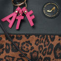JACKIE medium black and leopard tote with pink keychain, gold shoe charm, premium material and pattern design.