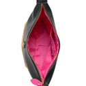 Inside of black vegan leather bag with pink lining and zipper pocket