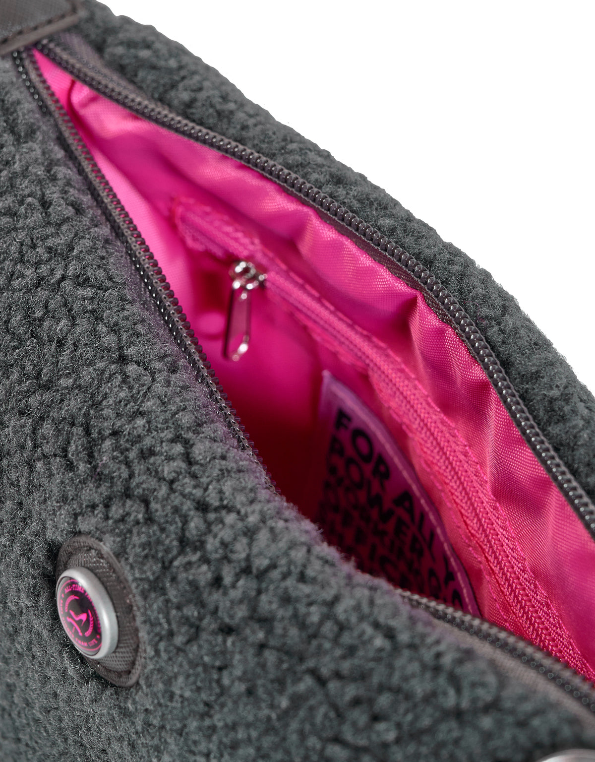 Grijze teddy-make-uptas met roze voering, vak met ritssluiting en label aan de binnenkant, HAMBURG van All-time Favourites.