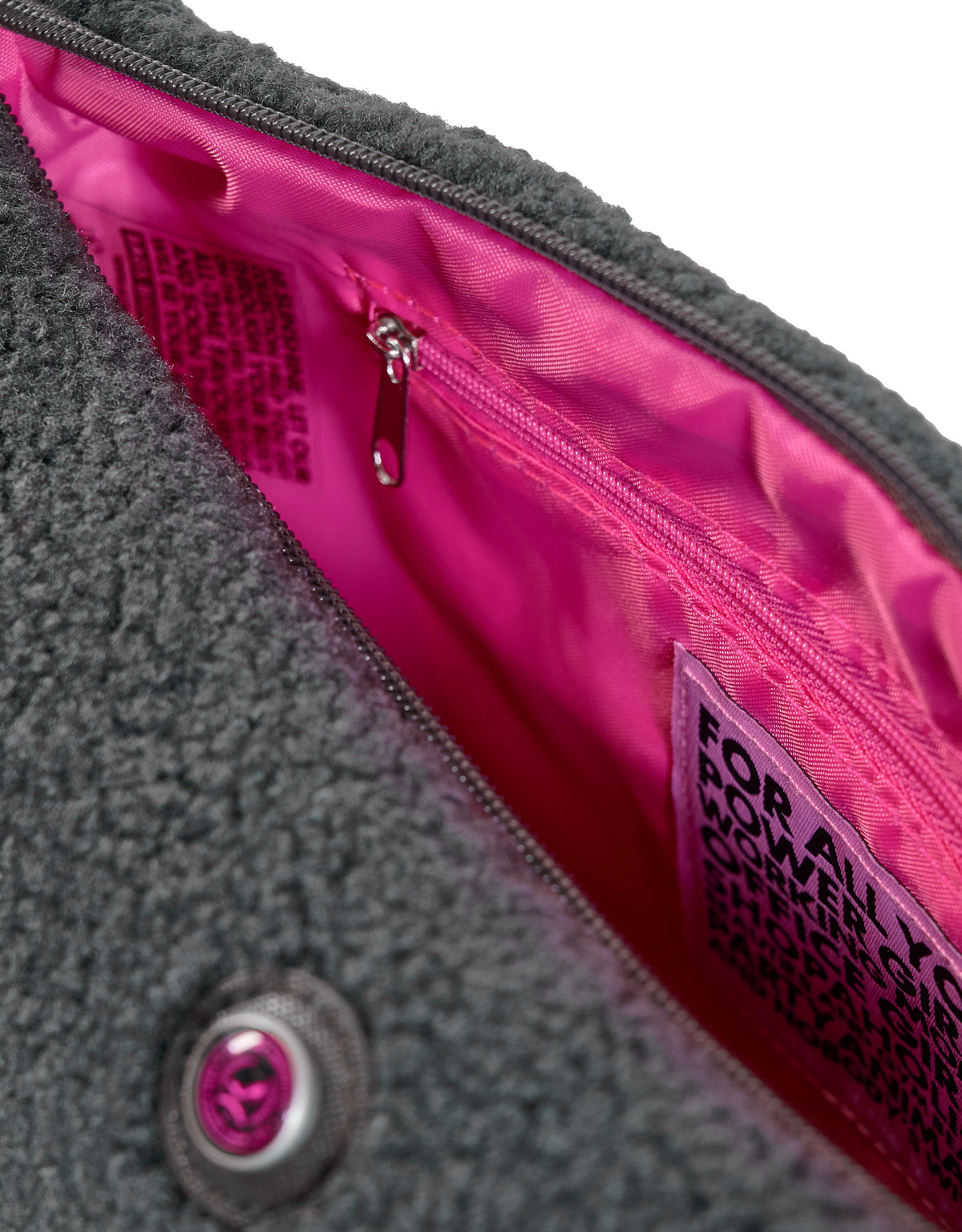 Grey teddy fabric toiletry bag with pink lining, zipper pocket, and HAMBURG inner label by All-time Favourites.